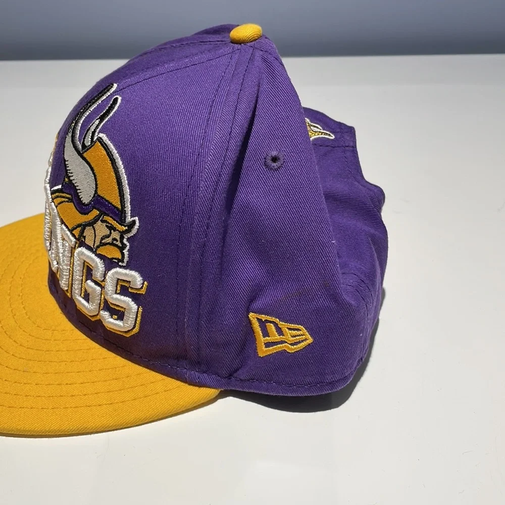 New Era Minnesota Vikings SnapBack Baseball Hat.